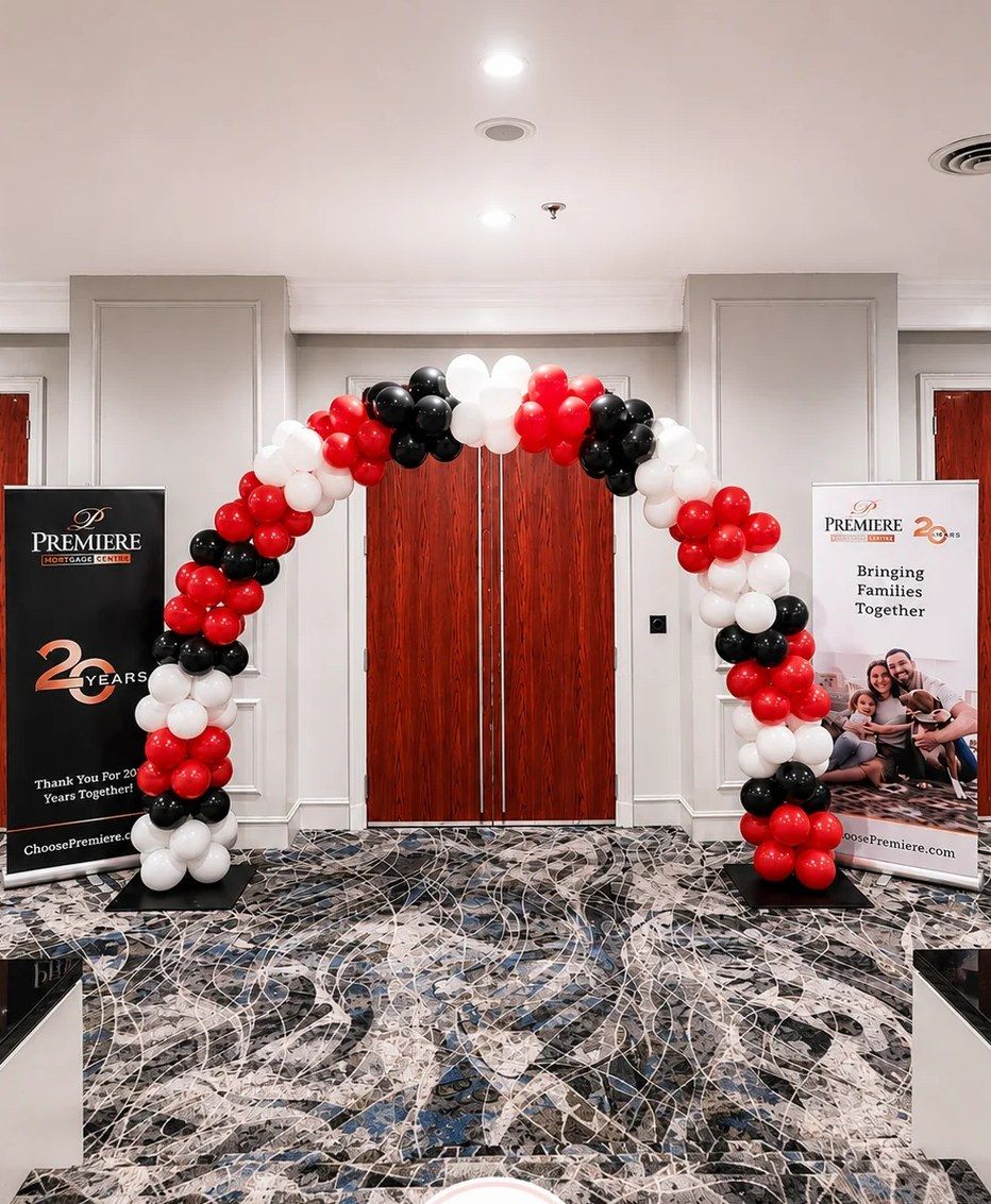 Red, white and black arch in a hallway