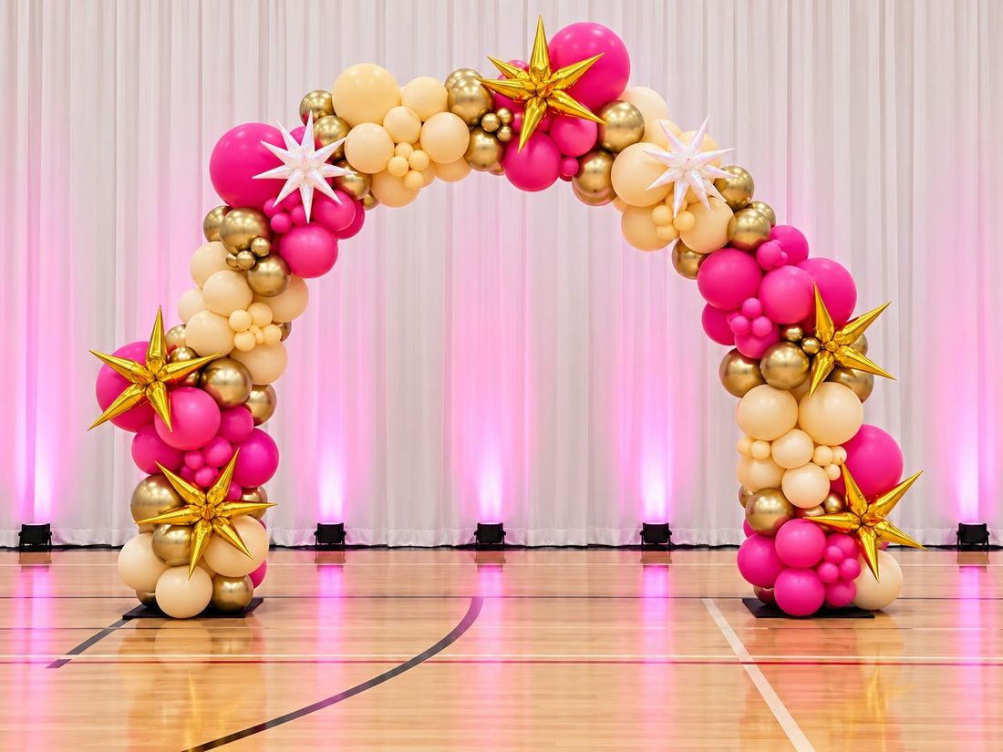 Hot pink, peach and gold organic arch with gold and white starbursts